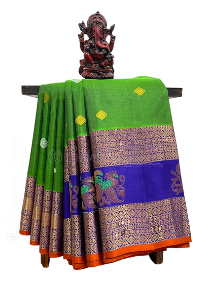 Big Gap Double Peacock Border Grass Green Pure Silk Saree