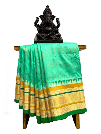 Kanchi  Light Green Stripes Butta Pure Silk Sarees