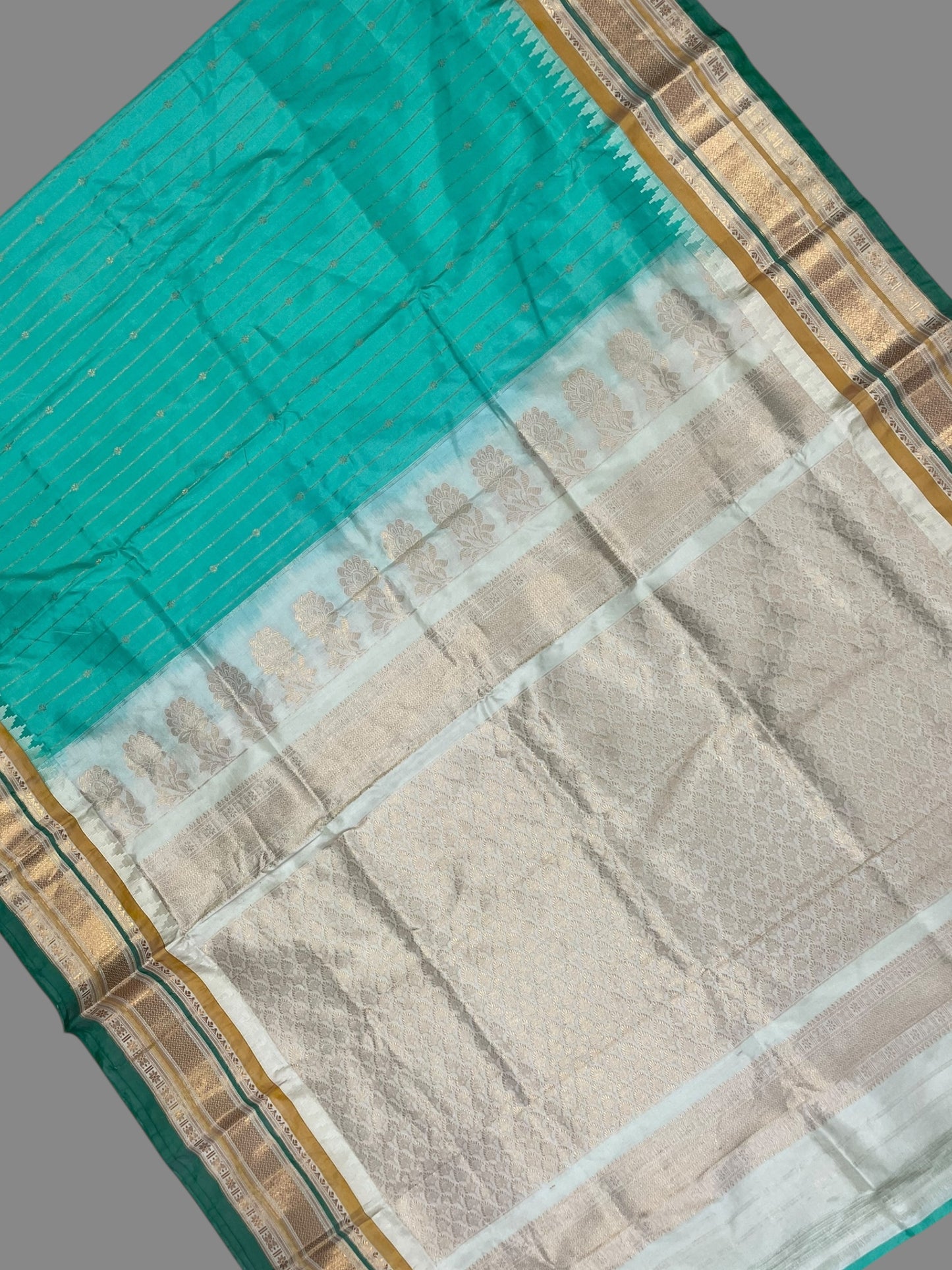 Kanchi  Light Green Stripes Butta Pure Silk Sarees