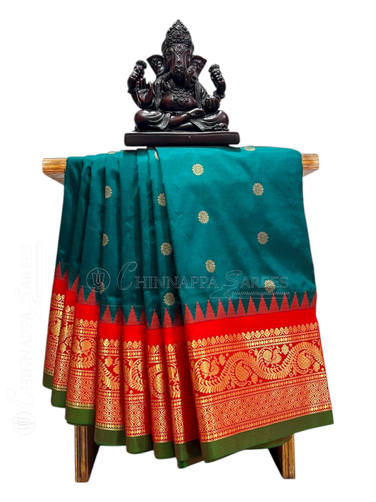 Shilpi  Border Peacock Green Pure Silk Saree