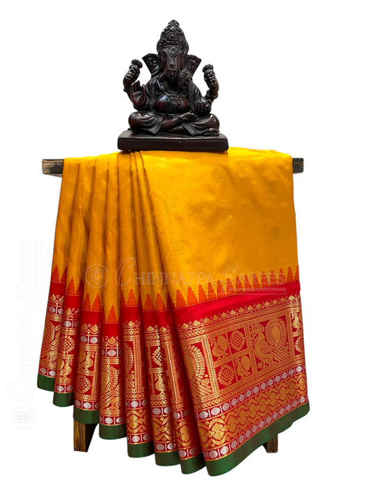 Gadwal Peacock Border Yellow Silk Saree