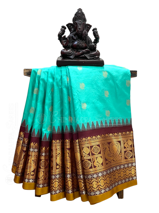 Gadwal Peacock Border Light Blue Silk Saree