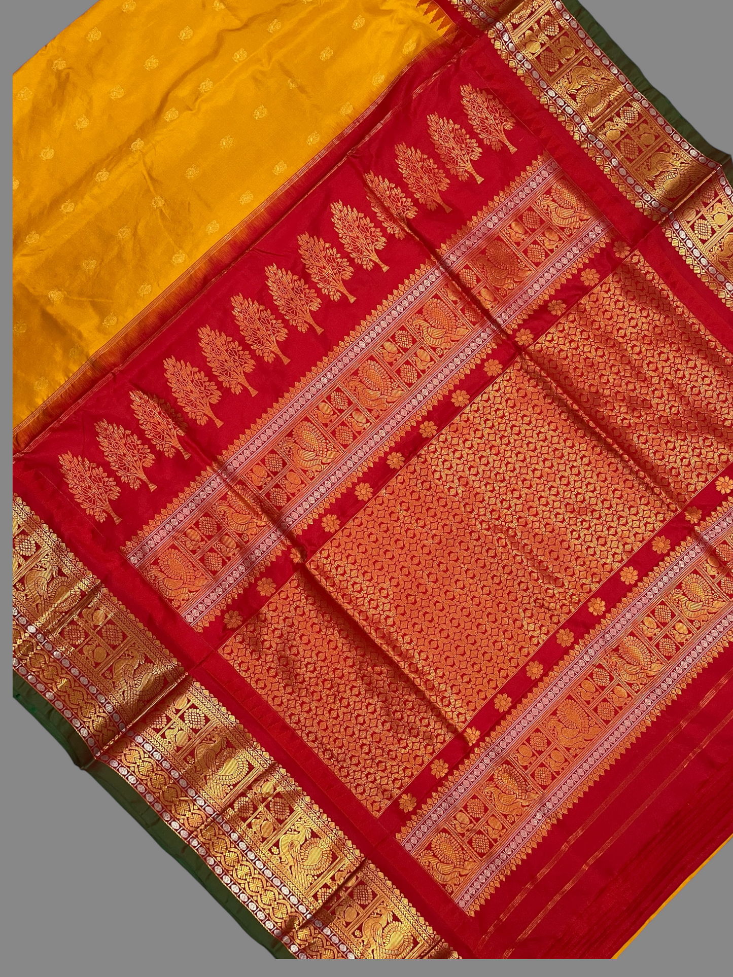 Gadwal Peacock Border Yellow Silk Saree