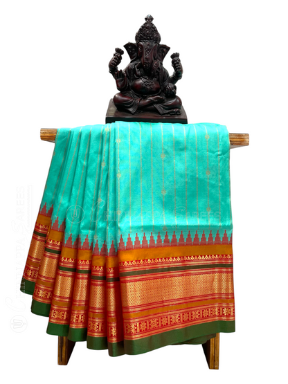 Kanchi  Light Green Stripes Butta Pure Silk Sarees