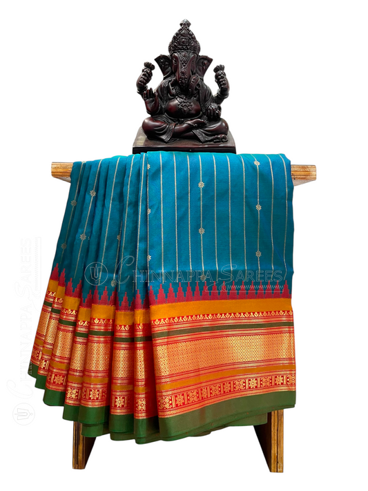 Kanchi Peacock Green Stripes Butta Pure Silk Sarees