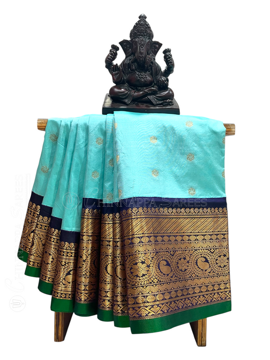 Gadwal Flower Butta Light Blue Pure Silk Sarees