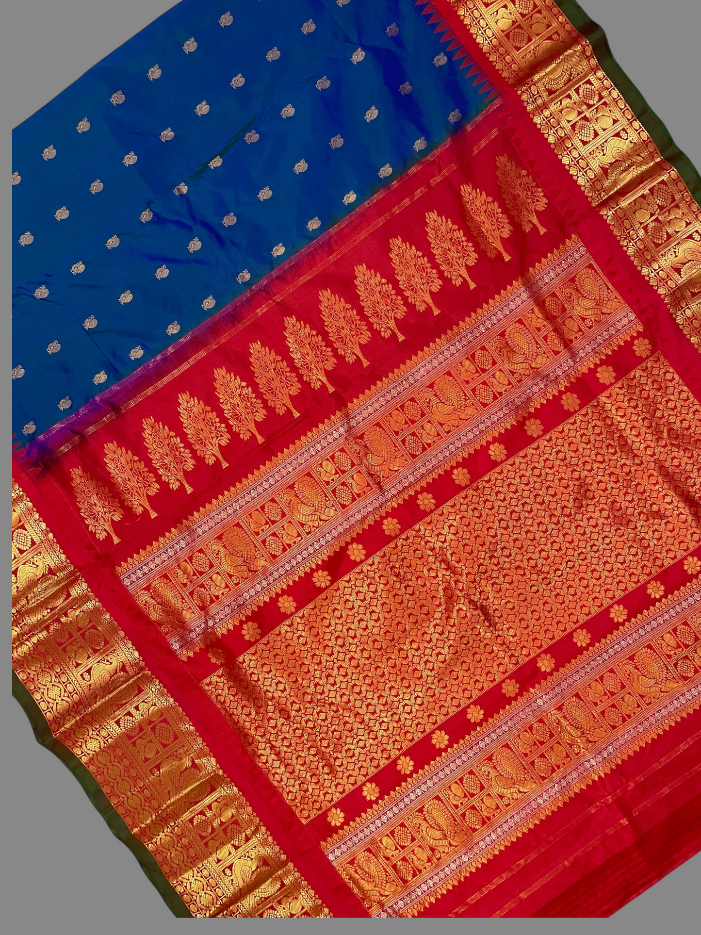 Gadwal Peacock Border Peacock Blue Silk Saree