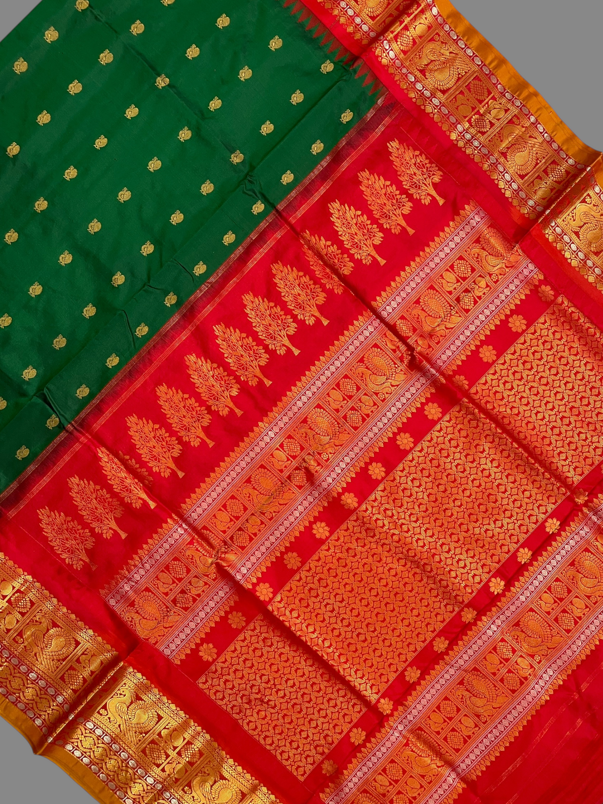 Gadwal Peacock Border Bottle Green Silk Saree